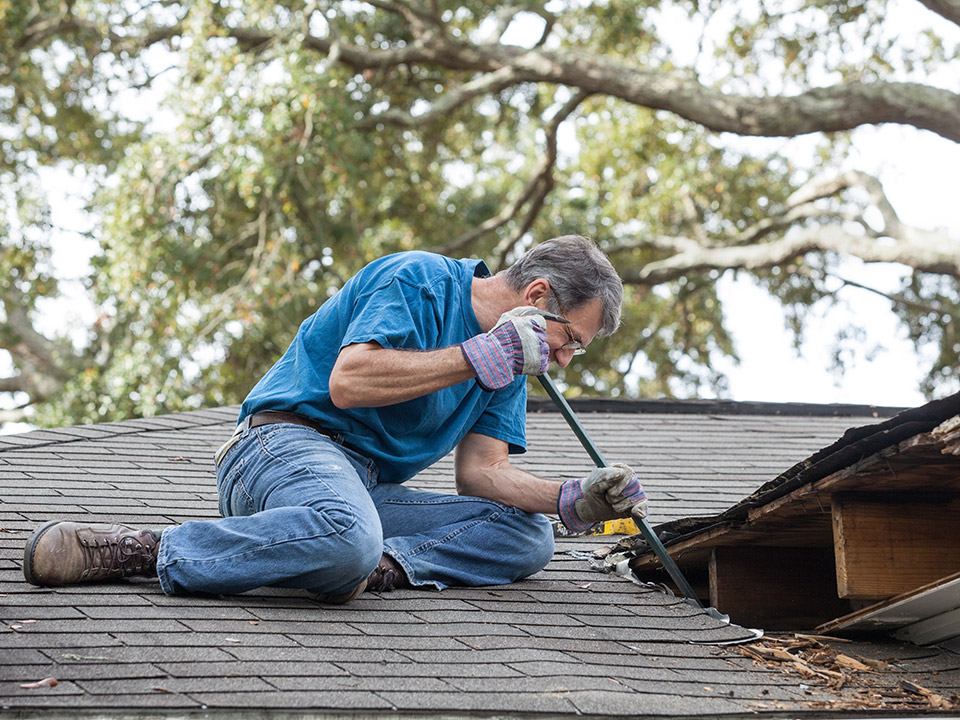 man working home roof