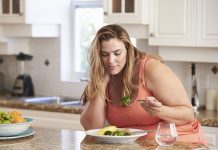 overweight woman eating